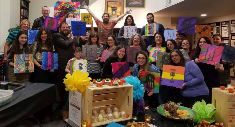 Chabad hosts Jewish pop art event A few of the creative paintings that were made at the Jewish Pop Art event.