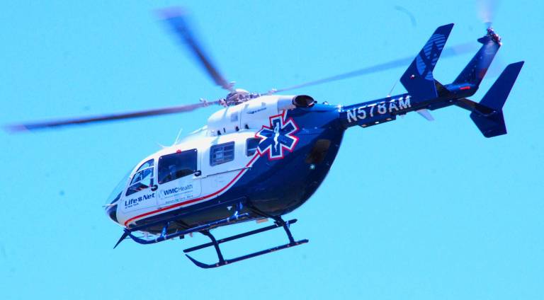 After spending some time being admired on the ground, this Medivac helicopter took off (Photo by Ed Bailey)