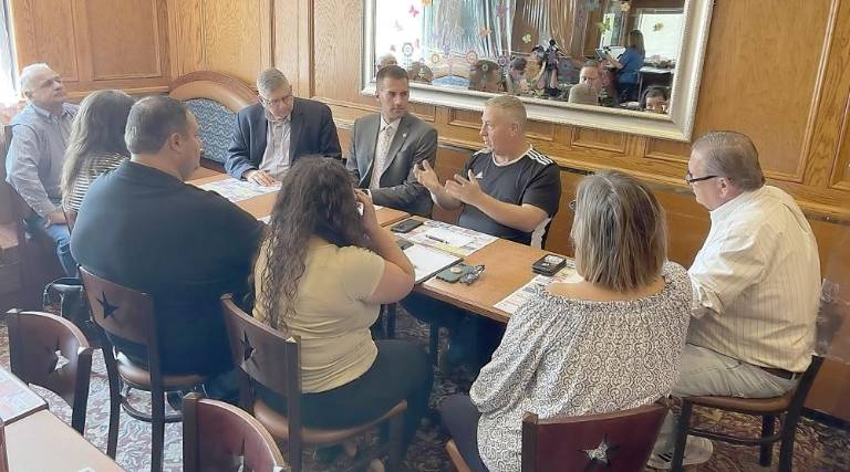 Assemblyman Colin J. Schmitt and state Conservative Party Chairman Gerard Kassar met Friday with Orange County Legislator Peter Tuohy, members of the Monroe Chamber of Commerce and area small business owners, Village of Monroe Trustee Dorey Houle and Town of Monroe Supervisor Tony Cardone at the Empire Diner in Monroe. Provided photo.