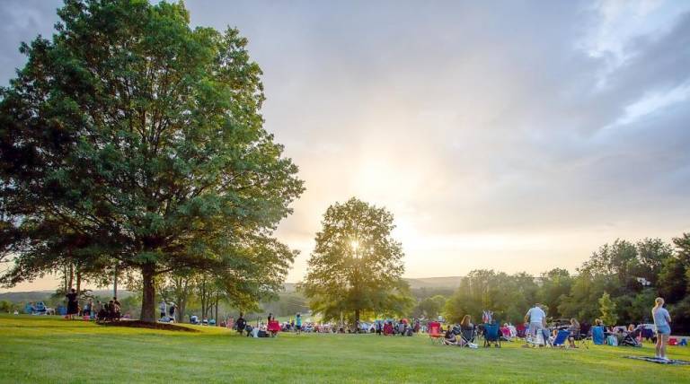 Hundreds of people spaced out across the field at Thomas Bull Memorial Park in Montgomery, where they ate food from local vendor trucks, listened to live music and enjoyed time with their families as they waited for dusk to approach and for Freedom Fest to begin. Photos by Sammie Finch.