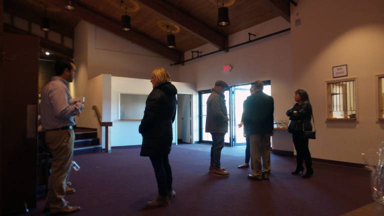 Community tours performing arts center before deciding its fate at the polls Conversations took place in many areas of the facility (Photo by Frances Ruth Harris)