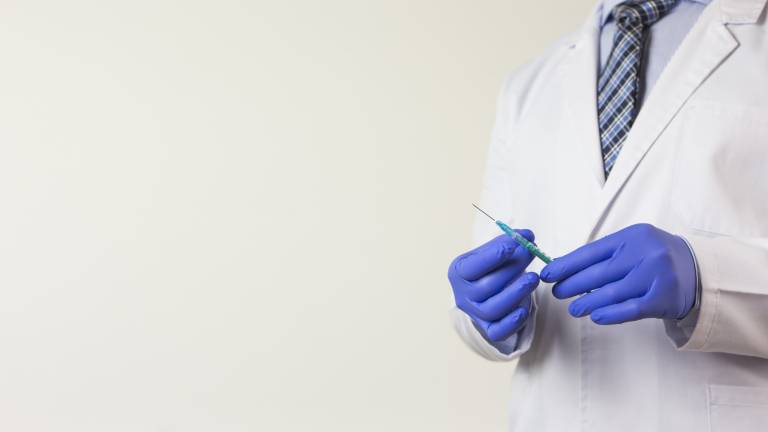 NY judge won't block ban on religious vaccine exemption <a href="Background photo created by freepik - www.freepik.com">freepik.com</a>