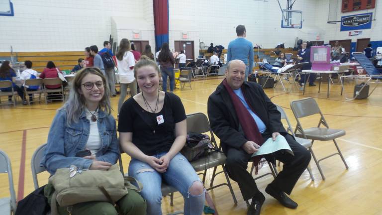 Hundreds give at Goshen blood drive Riley Mead, Kelly McCloud and Joel S. Finkelstein giving moral support as they wait to give blood (Photo by Frances Ruth Harris)