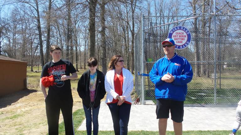 New batting cage honors Art Borin Tim, Kay and Karen Borin with Drew Whitney give opening remarks at dedication ceremony (Photo by Frances Ruth Harris)