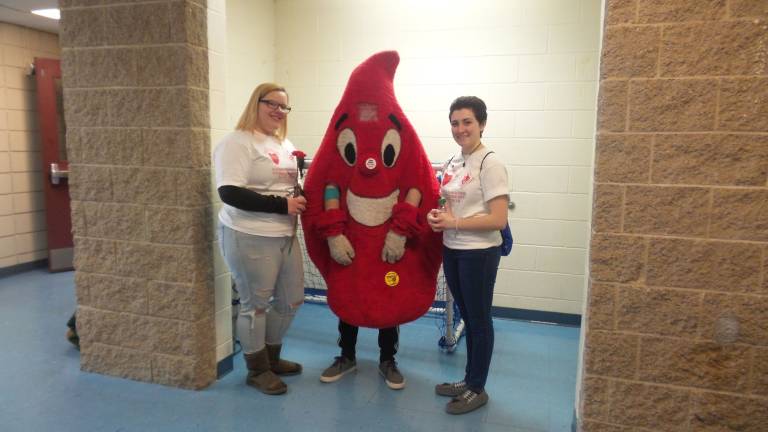 Hundreds give at Goshen blood drive Ryleigh Frey; Sean Noonan, the Blood Monster; and Zoe Gronner (Photo by Frances Ruth Harris)