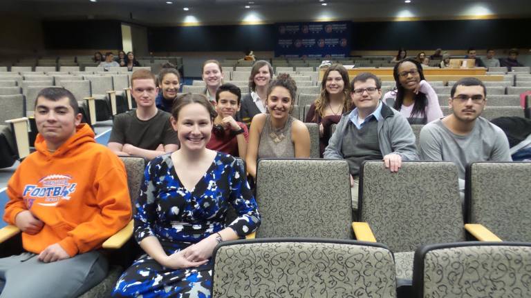 The forensics crew: front row: Christian Katt and teacher Julianne Tamucci; second row: Kevin Thomas, Jimmy Cendano-Franco, Julia Troisi, Donald Mee, and Jeorge Cortes. Third row: Emily Perez, Kaleigh Holtone, Caroline Holtone, Lea McLoughlin, and Shelby Maxi (Photo by Frances Ruth Harris)