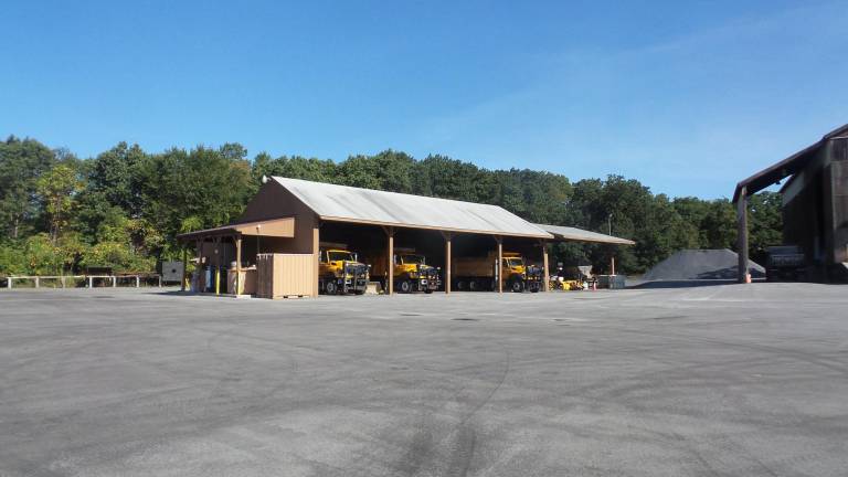 Town trucks at the highway department garage