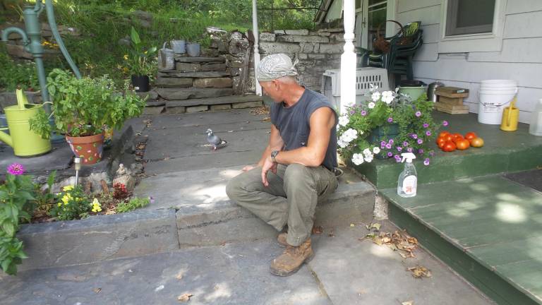 Tom Becker and his new friend at Mountain View Farm.