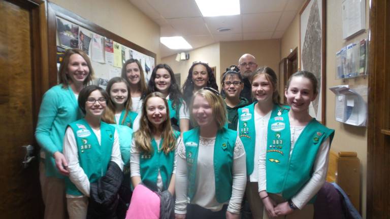 Scouts pitch worthy projects to the town board Chester Girl Scout Troop 387 and their leaders (from left): Kerry Cambria (troop leader), Gianna Hoehn, Stephanie Clark, Beth Clark (troop Leader) Sabrina Sanabria, Melissa Sanabria, Joella Podolsky, Phyllis Geraci, Jemma Bastian, Carlie Cambria, Abby Ferrari, Gianna Geraci, and Andrew Geraci. (Photo by Frances Ruth Harris)