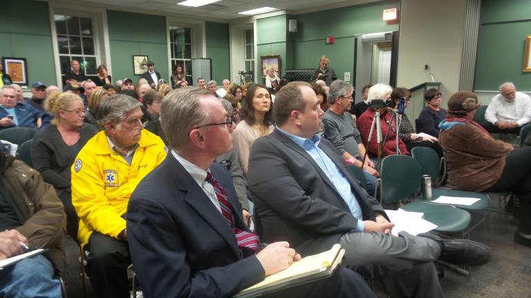 Andrew W. Glichrist, the attorney representing Maplewood Village (front left) is seated next to Maximilian A Stack, environmental planning consultant for Maplewood Village (Photo by Frances Ruth Harris)