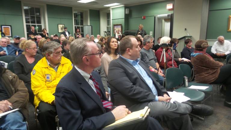 Hearing on hotels and houses brings out an impassioned crowd Andrew W. Glichrist, the attorney representing Maplewood Village (front left) is seated next to Maximilian A Stack, environmental planning consultant for Maplewood Village (Photo by Frances Ruth Harris)