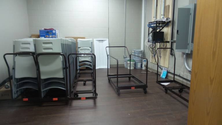 Chester celebrates brand-new senior center Storage for extra chairs and carts (Photo by Frances Ruth Harris)