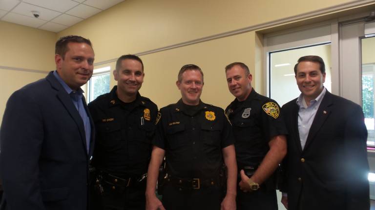 Chester celebrates brand-new senior center Orange County Supervisor Steve Neuhaus, Sergeant Rich Eckert, Town Police Chief Dan Doellinger, Officer Robert Bird, and Tom Basile, who is running to replace retiring Senator Larkin (Photo by Frances Ruth Harris)