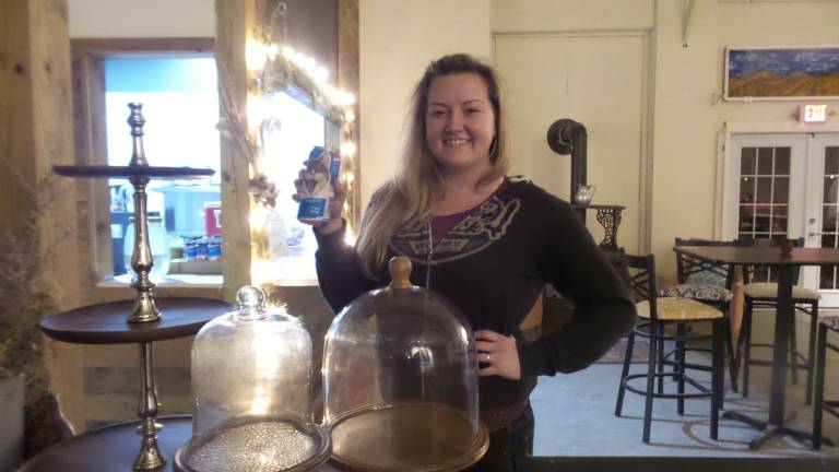 Nikki Cavanaugh of Rushing Duck Brewery came early to prepare for the open mic session (Photo by Frances Ruth Harris)