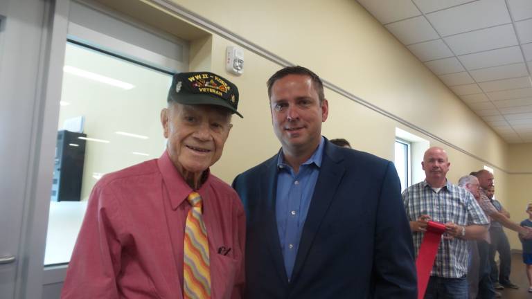 Chester celebrates brand-new senior center Retiring Senator Bill Larkin with County Executive Steve Neuhaus (Photo by Frances Ruth Harris)