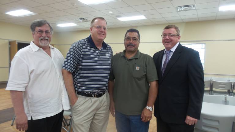 Chester celebrates brand-new senior center County Legislator John Vero, John Burleson, highway supervisor Anthony La Spina, and town supervisor Alex Jamieson (Photo by Frances Ruth Harris)