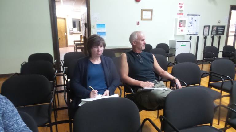 Cindy and Tom Becker at a planning board meeting (Photo by Frances Ruth Harris)