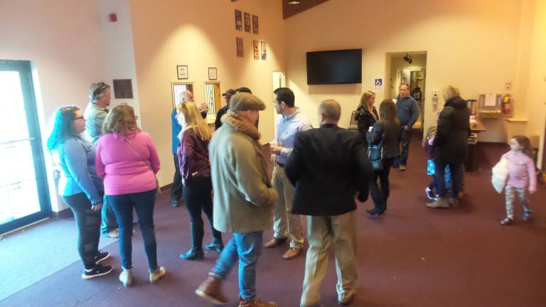 Community tours performing arts center before deciding its fate at the polls Conversations sprouted in every corner of the facility (Photo by Frances Ruth Harris)