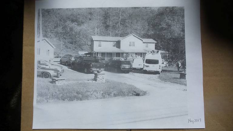 A photo submitted by Tom Becker with his complaint to show heavy trucks parked at the site (Photo by Frances Ruth Harris)