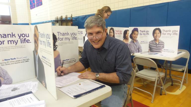 Hundreds give at Goshen blood drive Joseph Condello, Goshen High School biology teacher (Photo by Frances Ruth Harris)