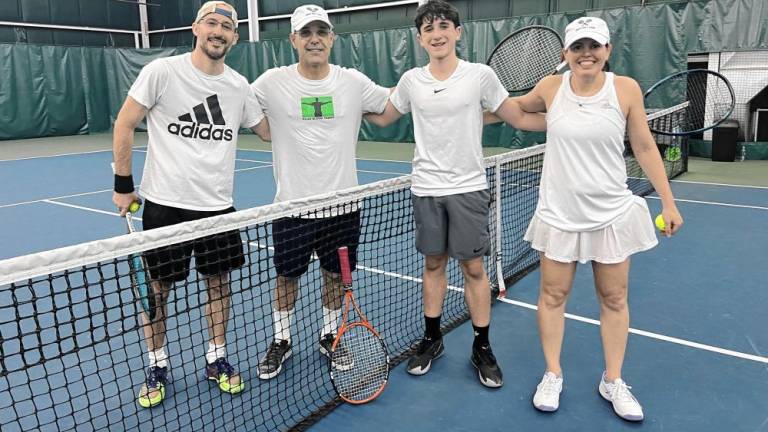 Shepard Hoffman poses with fellow tennis enthusiasts at the Serve for a Cause event, including tennis pro Anat Stein (Right), who has participated in the US Open and the Israel Davis Cup team, as well as the Olympics representing Israel.