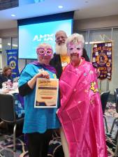 Lions Claire Gabelmann, Wayne Patterson and Barbara Gavin at the Lions District 20-O Convention in November.