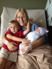 Lori Fedor and her boys shortly after Caleb's birth in August 2012.