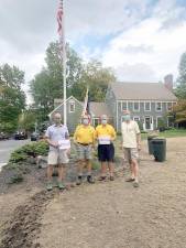 Pictured from left to right are Rotary members: Chris Tippin (vice president and Flags for Heroes chair), Mark Gargiulo (president), Rolly Peacock (treasurer) and Ron Klieverik (secretary). Photo provided by Amy Van Amburgh.