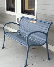 The Goshen Public Library &amp; Historical Society invites patrons to enjoy the new benches and gliders that were recently placed on the library building’s porch. Photos provided by Meghan Boroden/Goshen Public Library &amp; Historical Society.