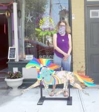 Eileen MacAvery Kane and her Painted Trotter outside the Happy Buddha in Goshen.