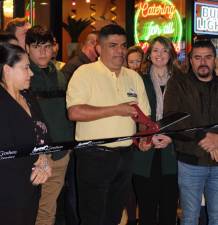 Carlos Cucina II owner Carlos Morales with Goshen Mayor Molly O’Donnell at the ribbon cutting ceremony Nov. 29. Photo provided.