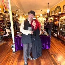 LightClub Curiosity Shoppe owner Melissa Paone Somma with her husband Catello Somma in the Warwick shop on Main Street.
