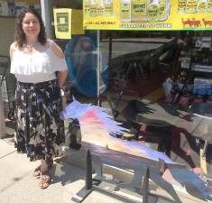 Emilia Estep with her Painted Trotter outside of Goshen Hardware.