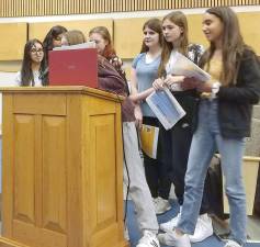 Eighth grade students present the Chester school board with a proposal to go to Rocking Horse Ranch for their field trip.