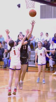 Monroe-Woodbury’s Gianna Pacciarelli drives to the basket in Goshen on Jan. 23.