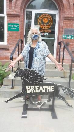 Susan Hillary with her Painted Trotter outside of the Orange County Office of Tourism in the Village of Goshen. Photo by Frances Ruth Harris.