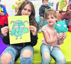Chester Academy seventh graders bring the CES first graders’ monster designs to life.