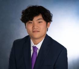 Henry Dong balances his with music