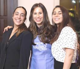 Israel Defense Force Raz Mizrahi, left, who was killed in the recent attacks in Israel, recently spoke to over 150 women and teens at Chabad of Orange County’s Mega Challah Bake. She is pictured with Chana Burston (middle) and fellow Israel Defense Force soldier Eliya Hrubi.