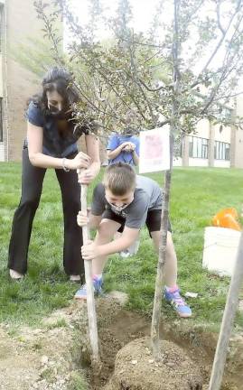 On Wednesday, April 28, the Chester Elementary School K-Kids Club planted a Prairie Fire Flowering Crab Apple Tree at the Chester Elementary School Memorial Garden in celebration of Arbor Day. Photos provided by Susan Bahren