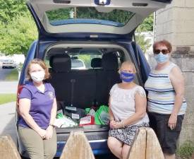 Cindy O'Connor, Sandra Nagler and Sue Bahren are ready to deliver welcome bags for all kindergarten students attending Chester Elementary School. Photos provided by the Chester Kiwanis Club.