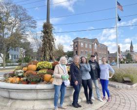 Volunteers from Goshen In Bloom spent time on Saturday morning to install this year’s fall decorations. Pictured from left to right are: Judy Green, Maureen Quattrini, Molly O’Donnell, Scott Wohl and Kristen O’Donnell. Photo provided by Scott Wohl.