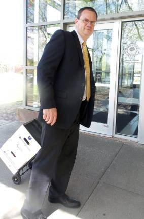Chris Borek, Chief Assistant District Attorney, arrives at the courthouse on Tuesday. (Photo by Frances Ruth Harris)