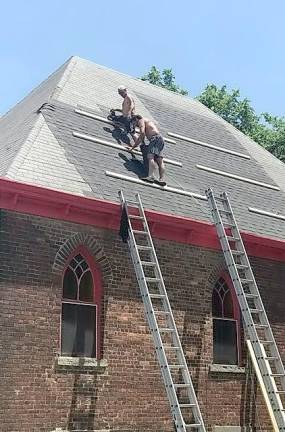 The St. John A.U.M.P. Church at 207 West Main St. in the Village of Goshen is having its roof repaired and reshingled, thanks to this community”s love and generosity, the Sacred Sites grant of The New York State Landmarks Conservancy and the expertise of crew and contractor, Eddie from Deck Masters. Provided photo.