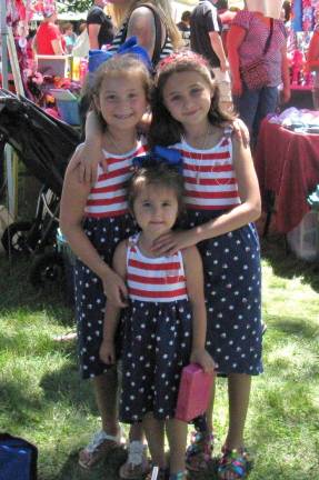 Pretty in stars and stripes: Angelina Barreto, 6, left, with friend Kierstynn Schoening, 7, and Kierstynn&#x2019;s little sister Jillyan Schoening, 3. The girls are best friends &#x2014; and their moms have been friends since kindergarten. They&#x2019;re all from Goshen. (Photos by Ginny Privitar)