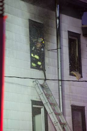 Goshen, NY Jan 13 2018. Firefighter inside the building.
