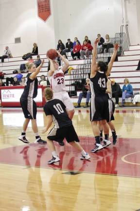 Kathleen Payne, #23, in action with the SUNY Plattsburgh Cardinals. (Photo courtesy Eric Paul)