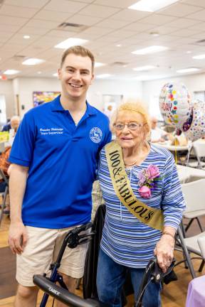 Chester Town Supervisor Brandon Holdridge with Sophie Halstead as she celebrated her 100th birthday at the Senior Center in Chester.