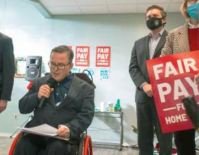 Doug Hovey, of Independent Living, at fair pay rally with Senator James Skoufis in October