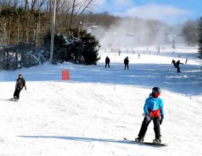 File photo by Roger Gavan of skiing and snowboarding at Mt. Peter Ski Area.